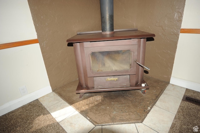 295 E 100 S, Centerfield, UT 84622 - details featuring a wood stove and a textured wall