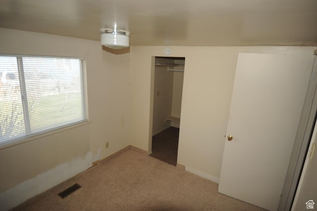 295 E 100 S, Centerfield, UT 84622 - unfurnished bedroom with carpet flooring, visible vents, a closet, and baseboards