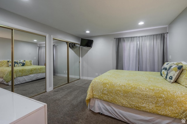 bedroom with recessed lighting, multiple closets, carpet flooring, and baseboards
