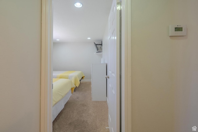 corridor featuring carpet floors and recessed lighting
