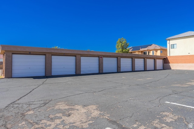 garage featuring fence