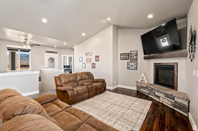 5185 N 600 E, Enoch, UT 84721 - living area with a stone fireplace, recessed lighting, dark wood-style flooring, lofted ceiling, and baseboards