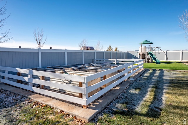 5185 N 600 E, Enoch, UT 84721 - deck with a yard, fence, a playground, and a vegetable garden
