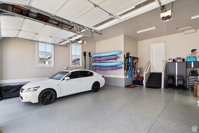 garage featuring a garage door opener