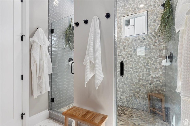 bathroom featuring a stall shower