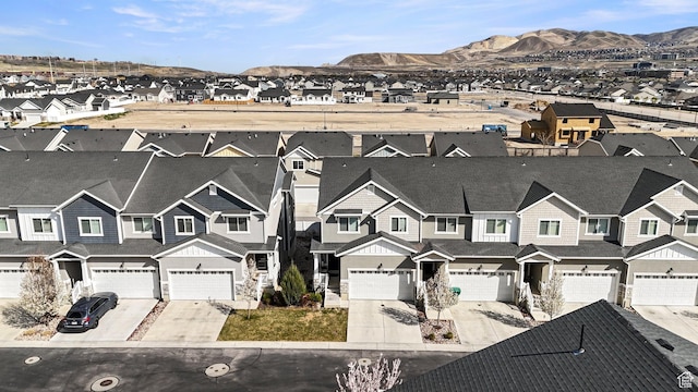 bird's eye view with a mountain view and a residential view