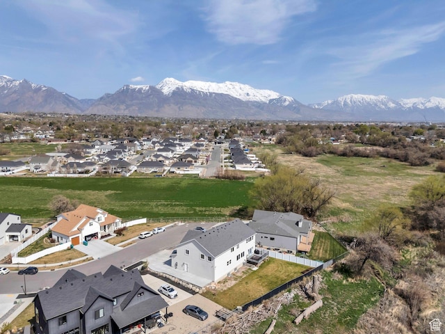 bird's eye view featuring a residential view and a mountain view