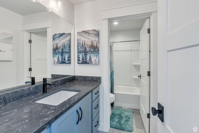 full bathroom featuring toilet, shower / bathtub combination with curtain, and vanity