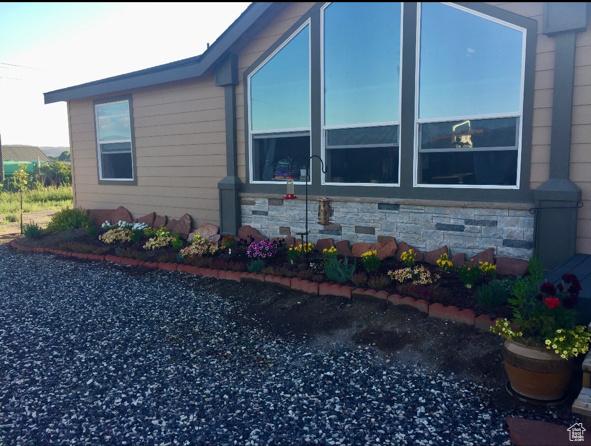 view of home's exterior with stone siding