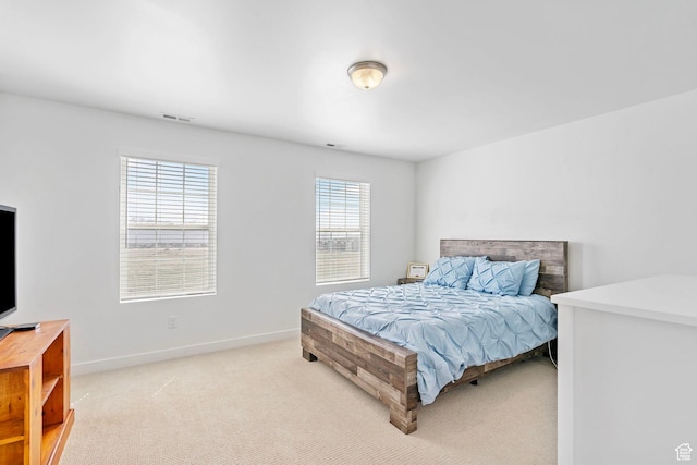 11612 S Watercourse Rd W, South Jordan, UT 84009 - bedroom with visible vents, baseboards, and light colored carpet