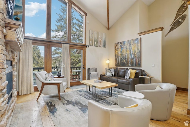 1335 Deer Valley Dr S, Park City, UT 84060 - living area featuring high vaulted ceiling, a fireplace, baseboards, and hardwood / wood-style flooring