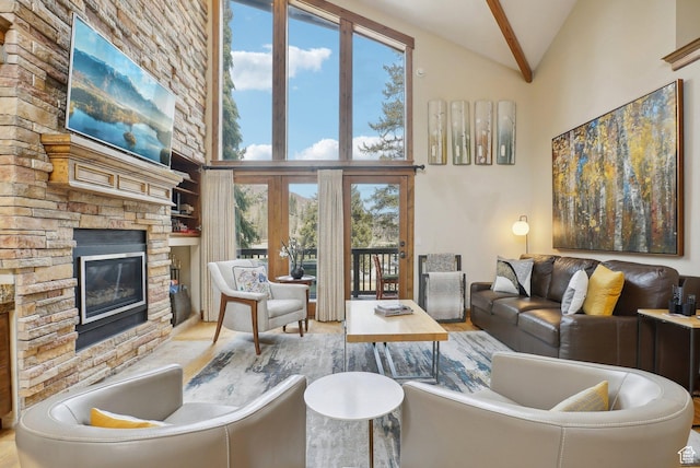 1335 Deer Valley Dr S, Park City, UT 84060 - living area featuring high vaulted ceiling, beamed ceiling, and a stone fireplace