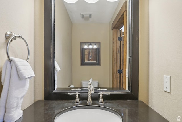 1335 Deer Valley Dr S, Park City, UT 84060 - bathroom with a sink, visible vents, and toilet