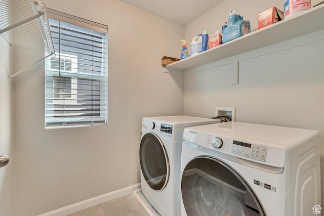 15191 S Ronaldo Ln, Herriman, UT 84096 - laundry area with baseboards, washer and dryer, and laundry area