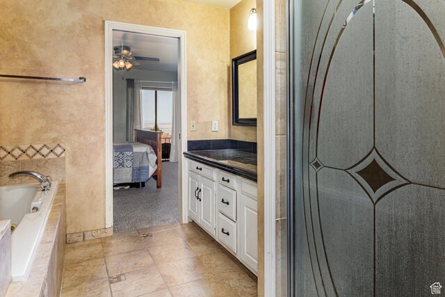1357 E Ridgewood Ln S, Bountiful, UT 84010 - bathroom featuring a bath, ensuite bath, vanity, and a ceiling fan