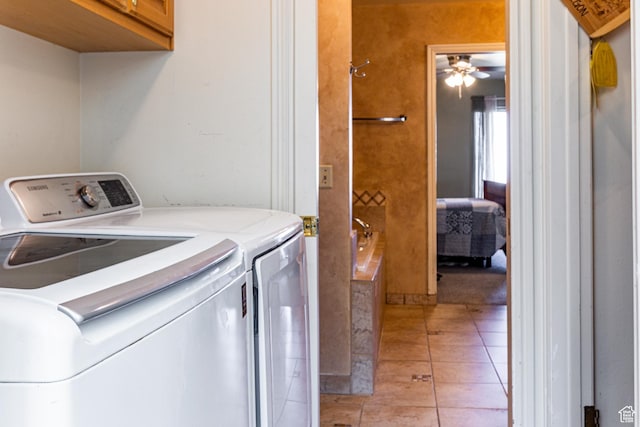 1357 E Ridgewood Ln S, Bountiful, UT 84010 - laundry area with washing machine and clothes dryer, ceiling fan, cabinet space, and light tile patterned floors