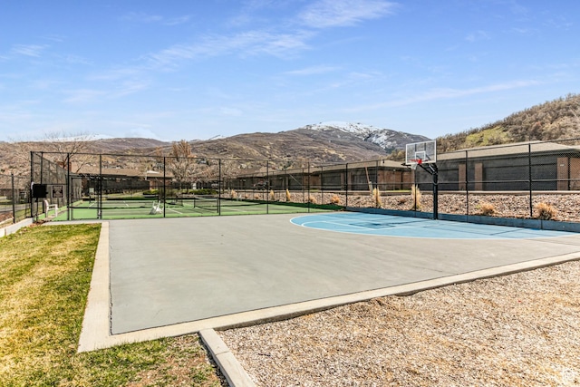 1357 E Ridgewood Ln S, Bountiful, UT 84010 - view of sport court with a mountain view, a tennis court, fence, and community basketball court