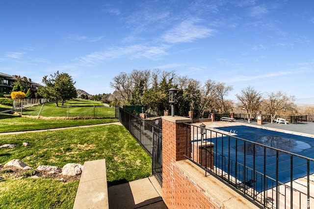 1357 E Ridgewood Ln S, Bountiful, UT 84010 - view of swimming pool with a fenced in pool, a patio area, fence, and a lawn