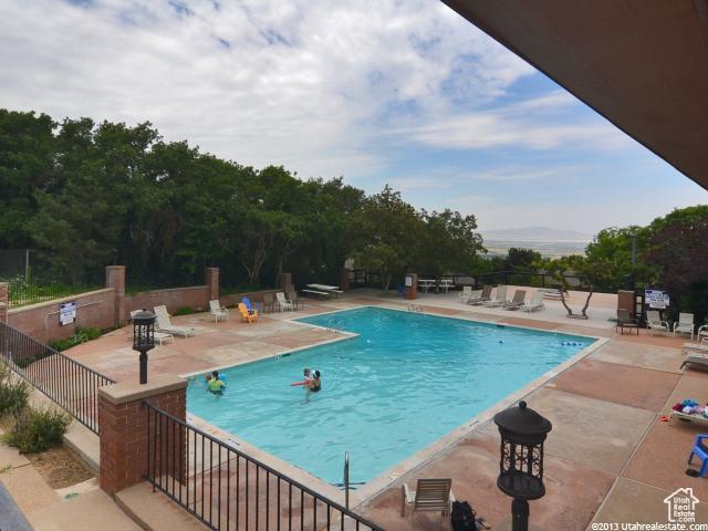 1357 E Ridgewood Ln S, Bountiful, UT 84010 - community pool featuring a patio area and fence