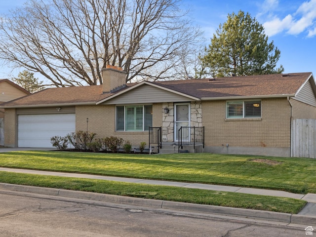 3168 W Ryan Dr, Taylorsville, UT 84129 - ranch-style house featuring a front yard, a garage, a chimney, fence, and driveway