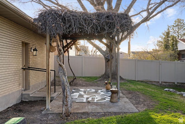 3168 W Ryan Dr, Taylorsville, UT 84129 - view of yard with a fenced backyard and a patio area