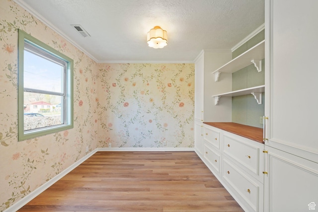 1489 W 300 S, Salt Lake City, UT 84104 - interior space with visible vents, light wood-type flooring, and wallpapered walls