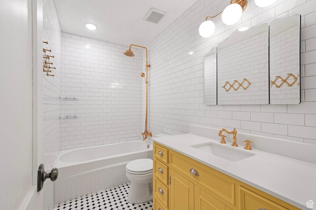 1489 W 300 S, Salt Lake City, UT 84104 - full bath featuring bathing tub / shower combination, vanity, visible vents, toilet, and tile walls
