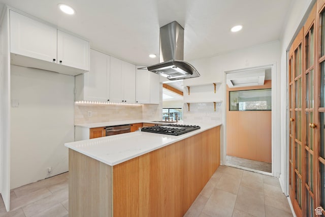 1489 W 300 S, Salt Lake City, UT 84104 - kitchen with a peninsula, white cabinetry, island exhaust hood, dishwasher, and backsplash