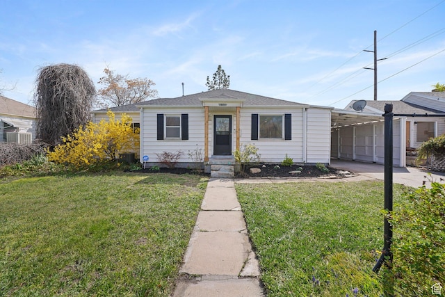 1489 W 300 S, Salt Lake City, UT 84104 - view of front of property featuring a front lawn, an attached carport, and concrete driveway