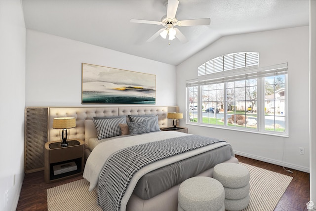 1181 W 4550 S Unit 26, Riverdale, UT 84405 - bedroom with lofted ceiling, multiple windows, wood finished floors, a ceiling fan, and baseboards
