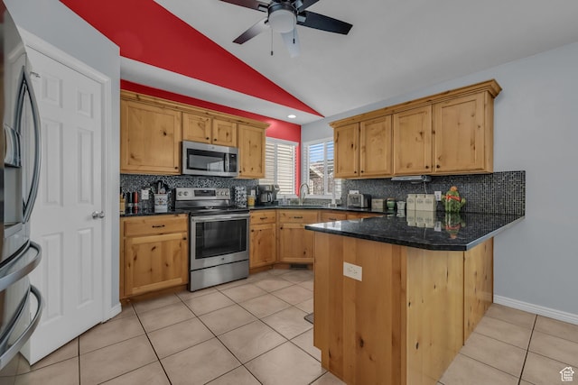 358 W Bricker Rd, Draper, UT 84020 - kitchen featuring vaulted ceiling, a peninsula, light tile patterned flooring, ceiling fan, and stainless steel appliances
