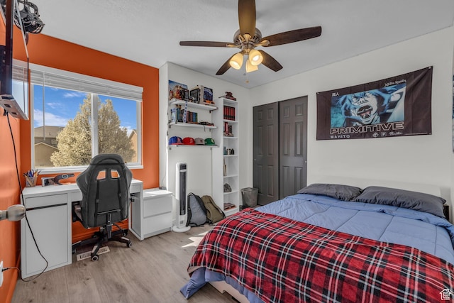 358 W Bricker Rd, Draper, UT 84020 - bedroom with a closet, light wood finished floors, and a ceiling fan