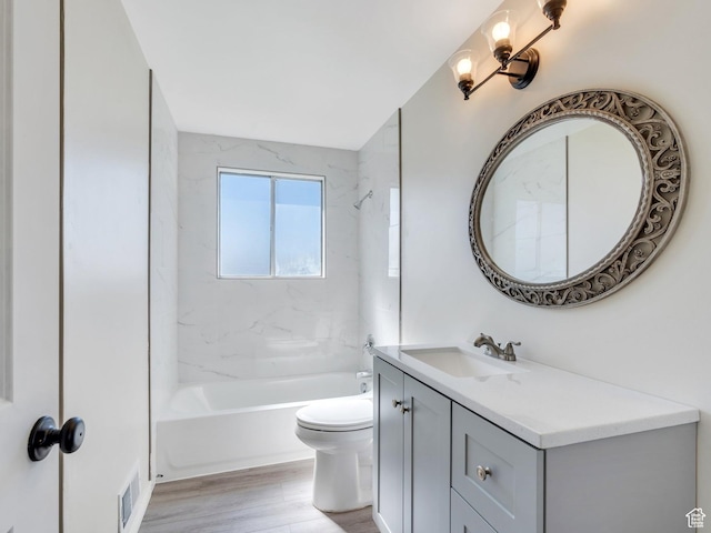 794 N Amethyst St, Layton, UT 84041 - full bath featuring visible vents, toilet, vanity, wood finished floors, and shower / tub combination