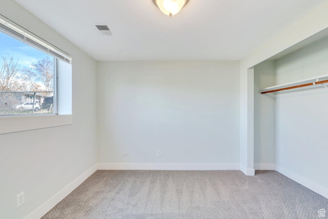 794 N Amethyst St, Layton, UT 84041 - unfurnished bedroom with a closet, carpet flooring, baseboards, and visible vents