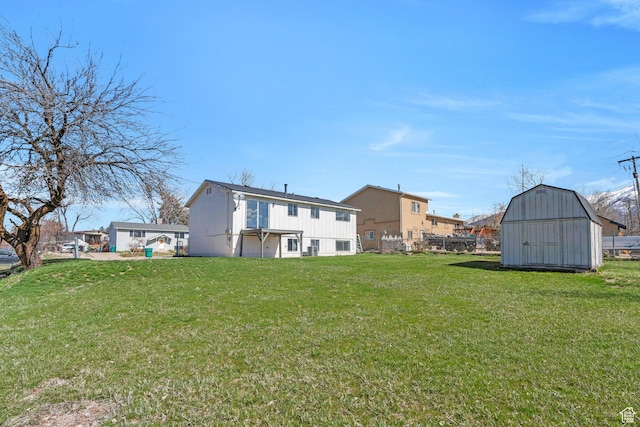 794 N Amethyst St, Layton, UT 84041 - rear view of house featuring an outbuilding, a yard, and a shed