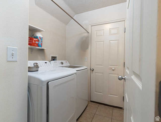 280 N Beacon Dr W, Cedar City, UT 84720 - washroom featuring light tile patterned floors, separate washer and dryer, laundry area, and a textured ceiling