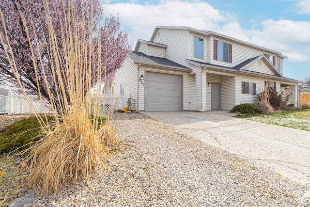 280 N Beacon Dr W, Cedar City, UT 84720 - view of front of house with concrete driveway, fence, and an attached garage