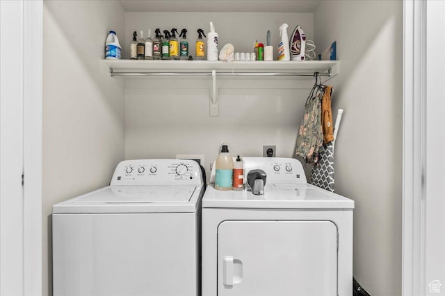 laundry area featuring independent washer and dryer and laundry area