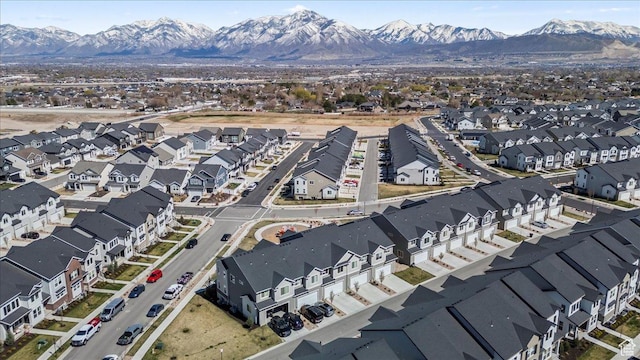 aerial view featuring a mountain view and a residential view