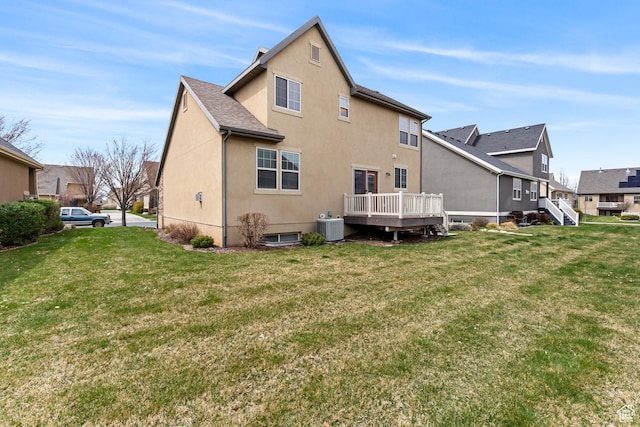 763 S Silver Leaf Dr, Mapleton, UT 84664 - rear view of property with central air condition unit, a yard, a wooden deck, and stucco siding