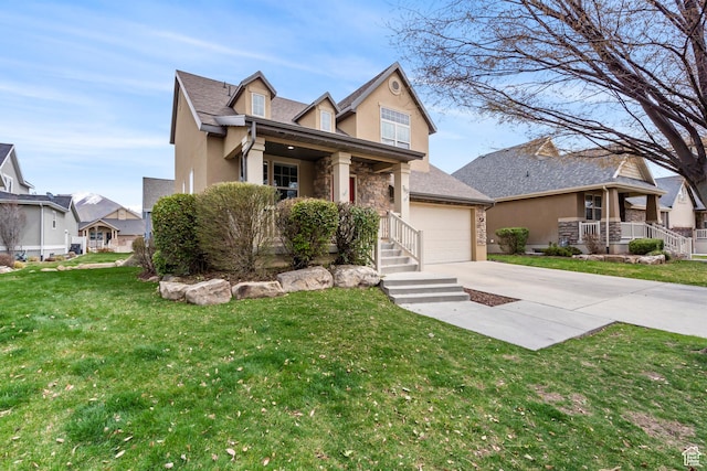 763 S Silver Leaf Dr, Mapleton, UT 84664 - view of front of home with concrete driveway, stucco siding, a garage, and covered porch