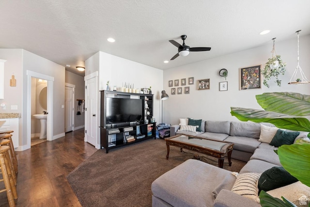 2046 W Fairway Ln, Orem, UT 84058 - living room featuring baseboards, a ceiling fan, a textured ceiling, dark wood-style floors, and recessed lighting