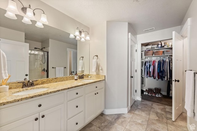 2046 W Fairway Ln, Orem, UT 84058 - full bath with a stall shower, double vanity, a sink, and visible vents