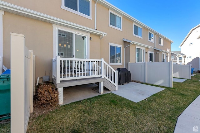 2046 W Fairway Ln, Orem, UT 84058 - back of house with a patio area, a lawn, fence, stucco siding, and a residential view