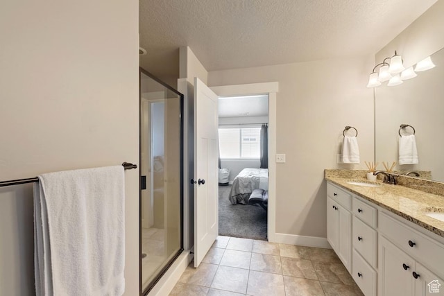 2046 W Fairway Ln, Orem, UT 84058 - ensuite bathroom featuring a shower stall, ensuite bath, double vanity, and a textured ceiling