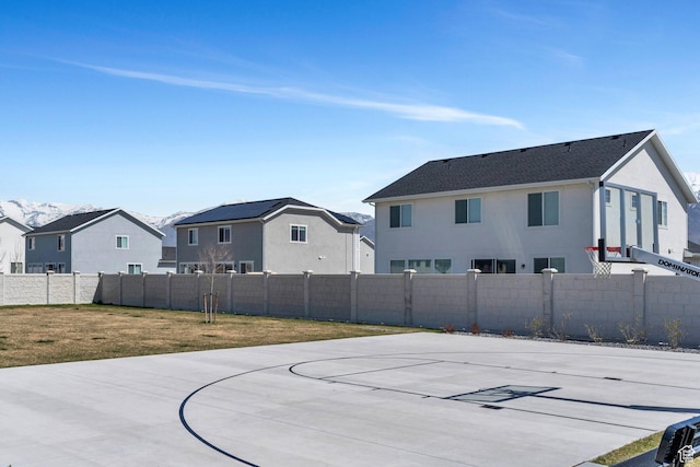 929 S 950 W, American Fork, UT 84003 - view of basketball court featuring basketball court, a yard, fence, and a residential view