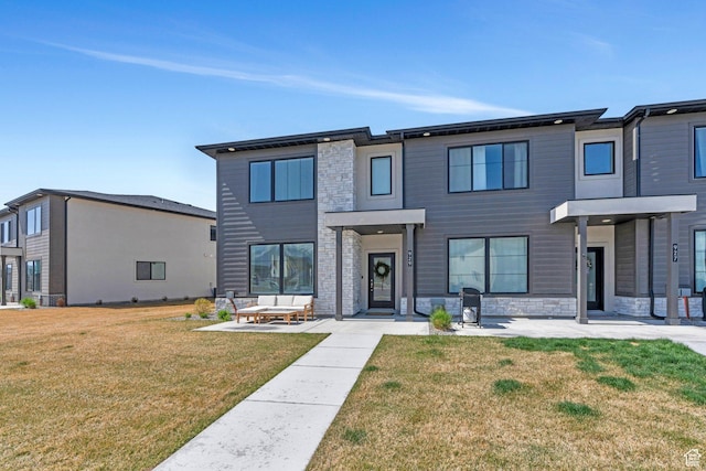 929 S 950 W, American Fork, UT 84003 - view of front of home featuring a front yard and stone siding