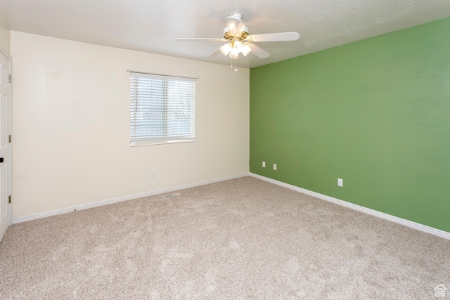 187 E 2300 N, North Ogden, UT 84414 - carpeted spare room featuring visible vents, baseboards, and ceiling fan