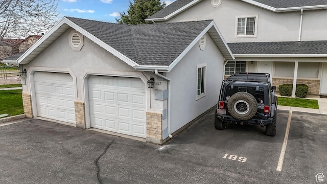 187 E 2300 N, North Ogden, UT 84414 - exterior space with brick siding, roof with shingles, and stucco siding