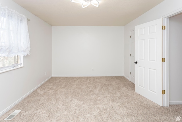 187 E 2300 N, North Ogden, UT 84414 - carpeted empty room featuring visible vents and baseboards